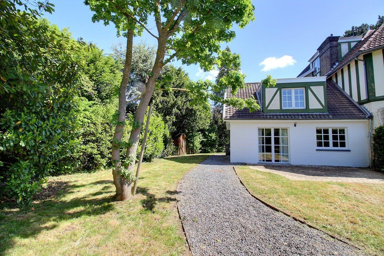 Maison de vacances avec jardin arboré